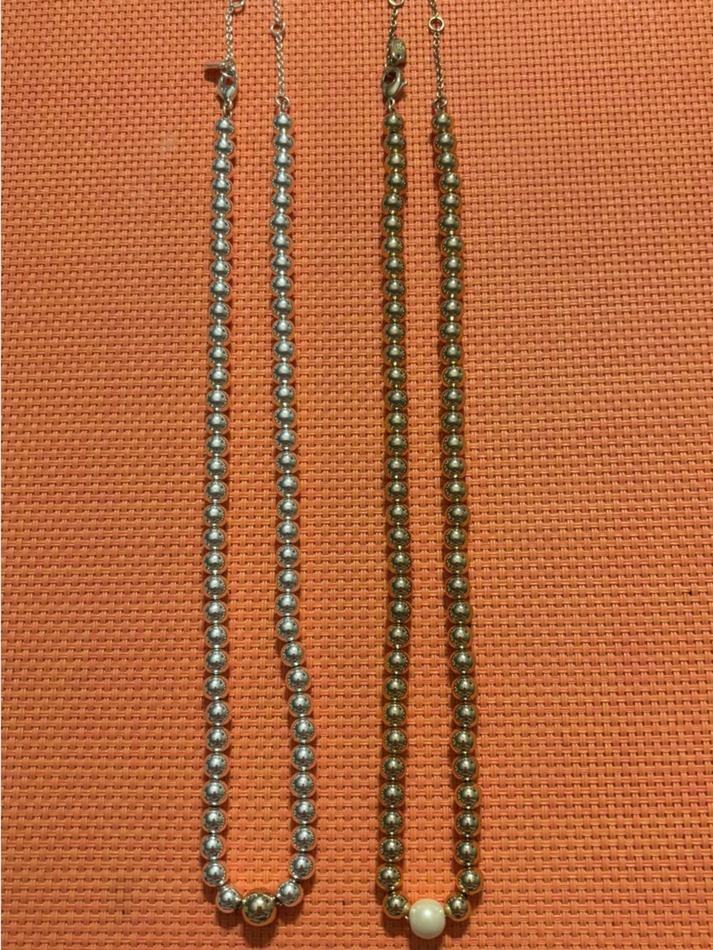 Beaded necklaces w/ contrasting accent beads.